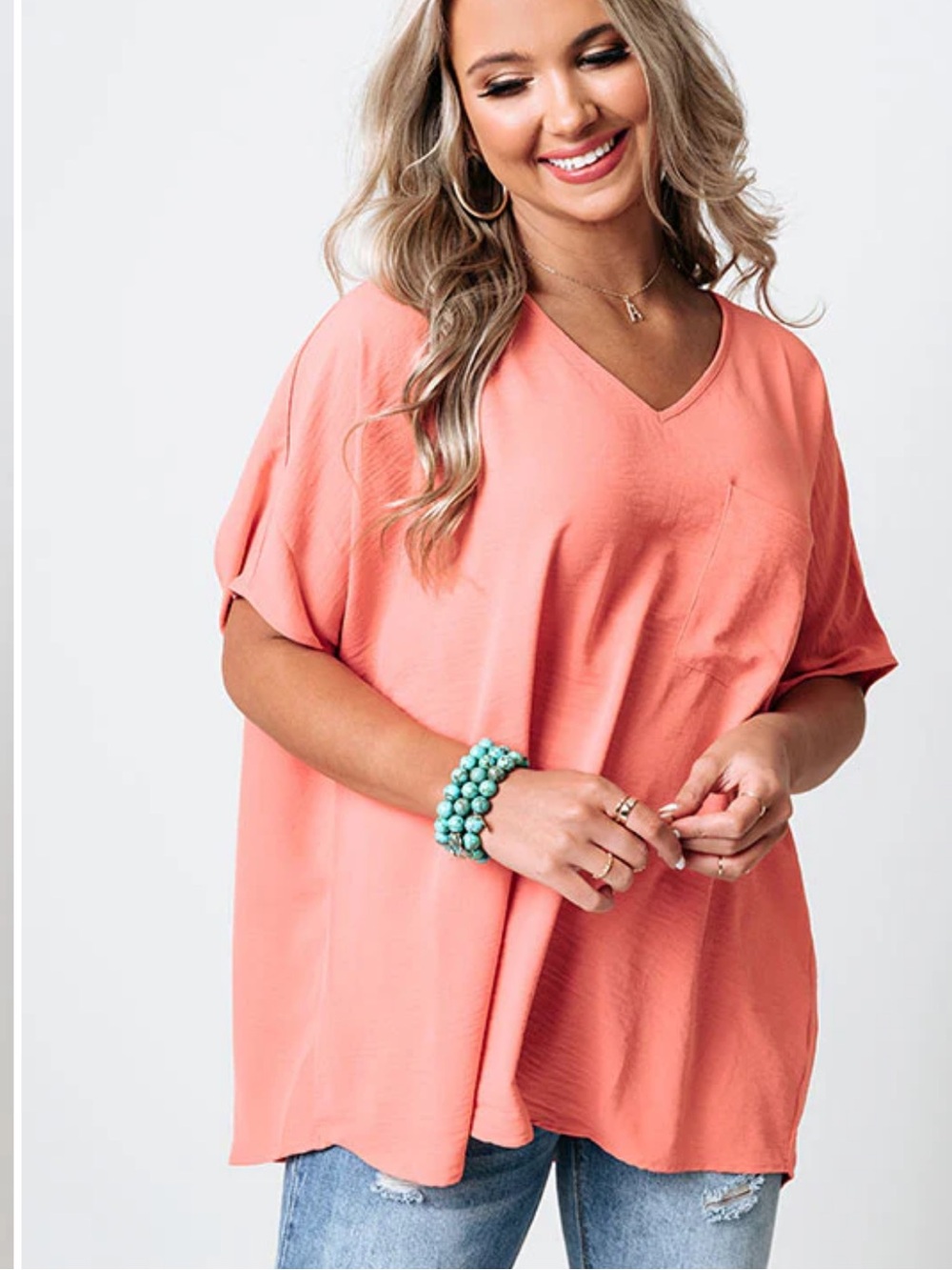 Women’s V-Neck Pocket Blouse in Coral Large impressions